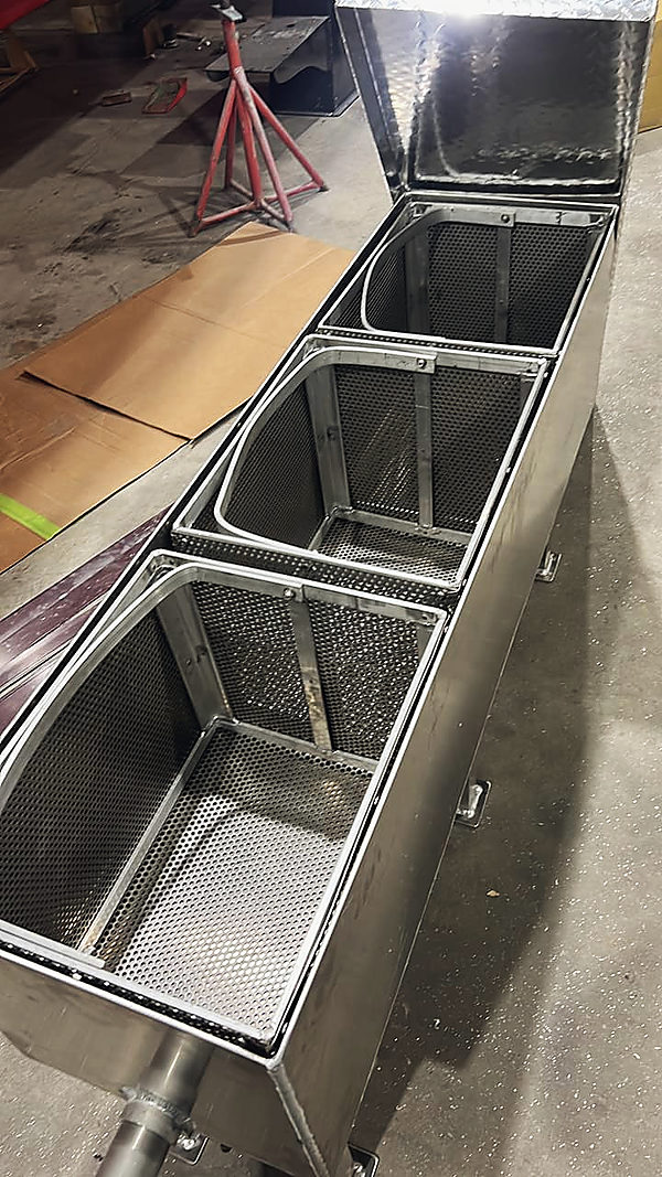 A box with three perforated baskets