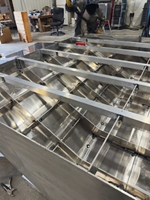 Inside a new aluminum hull, the framing welded out