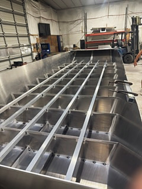 A long aluminum hull, every frame welded in