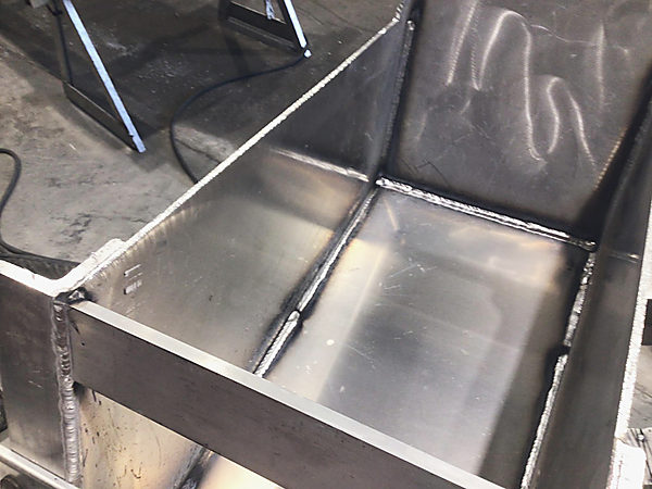 Inside a tank, the baffles welded in