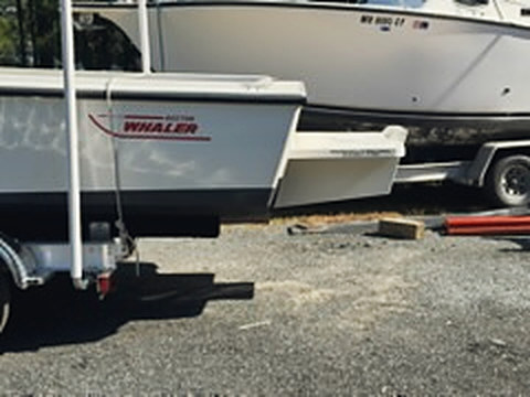The Whaler on its trailer, the bracket on the stern