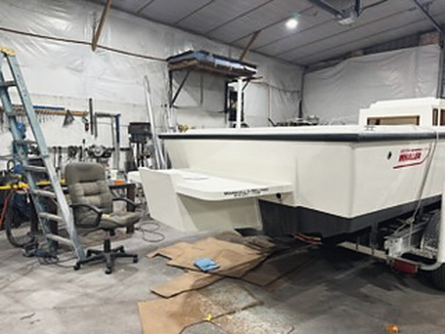 A Boston Whaler in the shop, the new stern bracket fitted